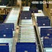 Palletizing, robotic palletizer and roller conveyor lines at Coles
